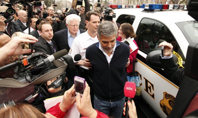 George Clooney is arrested for civil disobedience after protesting at the Sudan Embassy in Washington