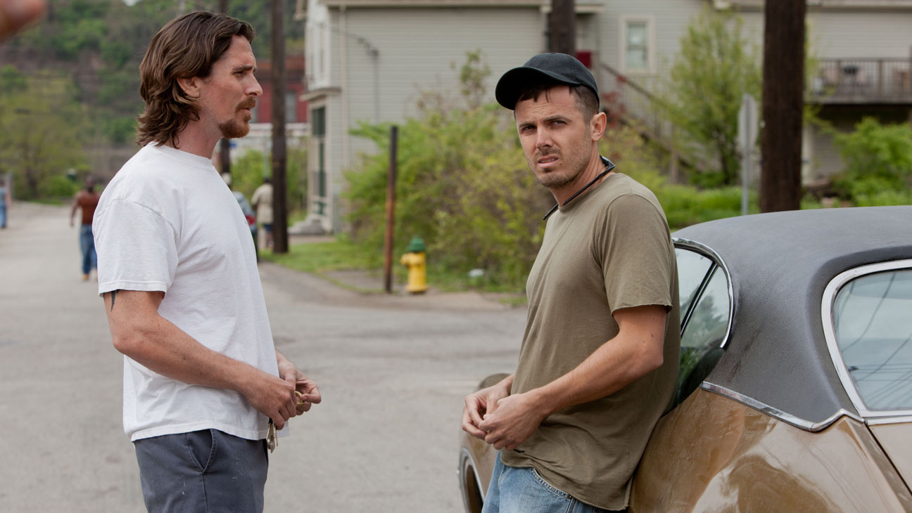 M 176 (Left to right.)  Stars Christian Bale and Casey Affleck in Relativity Media's Out of the Furnace..Photo Credit: Kerry Hayes.© 2012 Relativity Media..