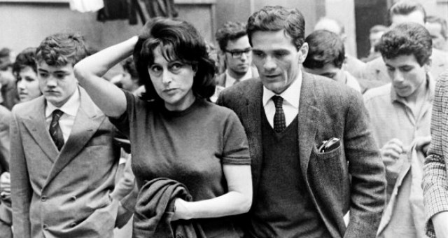 A photo taken on 1962 in Roma shows Italian writer and films' director Pier Paolo Pasolini (C)and the main characters of his film "Mamma Roma", Italian actress Anna Magnani (on his R) and actor Ettore Garofolo (L).  AFP PHOTO        (Photo credit should read STRINGER/AFP/Getty Images)